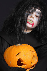 Image showing Halloween boy with pumpkin