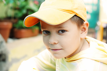 Image showing Boy in yellow cap