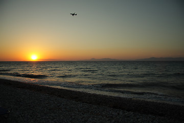 Image showing Plane in sunset