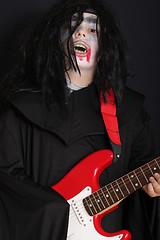 Image showing Halloween boy with guitar