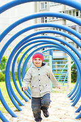 Image showing Boy running on playground