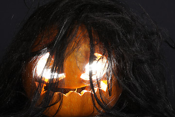 Image showing Halloween pumpkin with black hairs