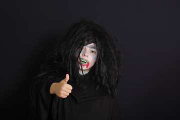 Image showing Halloween boy with thumb up