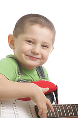 Image showing Happy boy with guitar