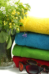 Image showing Flowers and towels