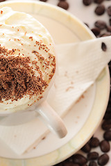 Image showing Cappuccino and coffee beans