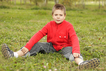 Image showing Sitting on grass