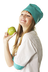 Image showing Smiling doctor with green apple