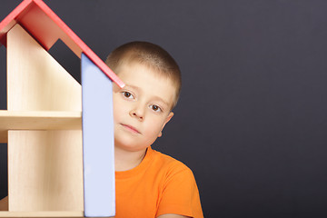 Image showing Looking out of toy house