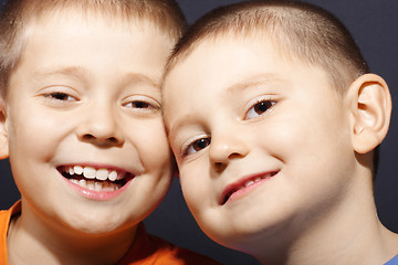 Image showing Smiling brothers