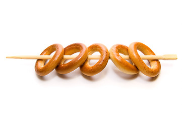 Image showing Bread rings on chopstick