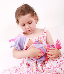 Image showing Playing with doll