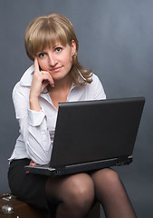 Image showing thoughtful girl with  laptop
