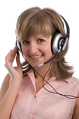 Image showing smiling young woman with headset