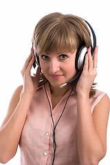 Image showing Young business woman with headset