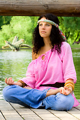 Image showing hippie woman meditating