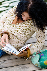 Image showing woman reading a book 