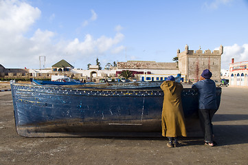 Image showing african men on fishing boat essaouira morocco