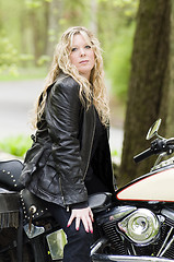 Image showing sexy woman on classic motorcycle