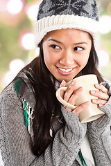 Image showing Beautiful asian woman drinking coffee