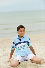 Image showing playful kid on the beach