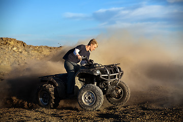 Image showing teen on quad four wheeler