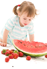 Image showing little girl with strawberry and watermelon