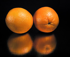 Image showing Oranges reflections