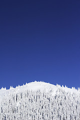 Image showing blue sky over mountain top