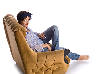 Image showing woman sitting in armchair
