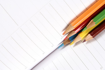 Image showing Color pencil and agenda