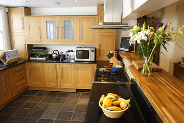 Image showing  wooded fitted kitchen interior