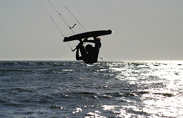 Image showing  kiteboarder upside down jump