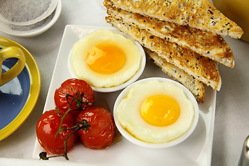 Image showing Poached Eggs And Tomatoes