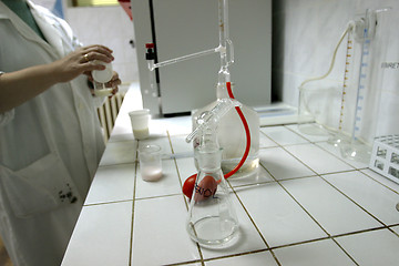 Image showing laboratory technician testing dairy products