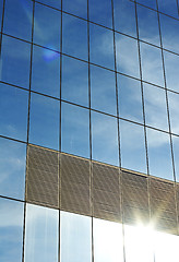 Image showing glass office building with reflection of sky