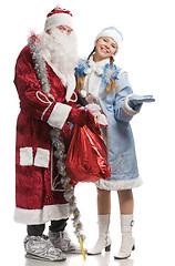 Image showing Santa Claus and snow maiden with stretched palm