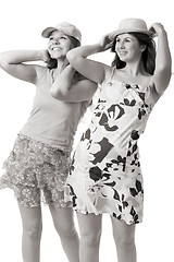 Image showing two smiling women in summer dresses