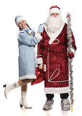 Image showing Snow girl  embraces Santa