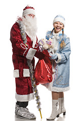 Image showing Snow girl and Santa Claus with gifts