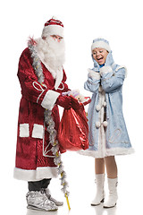 Image showing Surprised snow maiden and Santa Claus