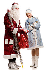 Image showing Smiling snow maiden and Santa Claus