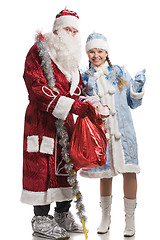 Image showing Smiling snow maiden and Santa Claus