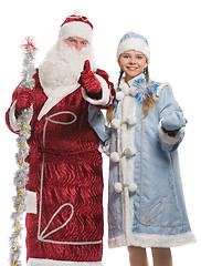 Image showing Santa Claus and snow maiden giving thumbs-up sign