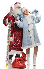 Image showing Santa Claus and snow maiden dancing