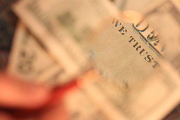 Image showing The back side of the banknote is under a magnifying glass