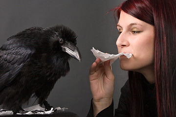 Image showing young woman with raven