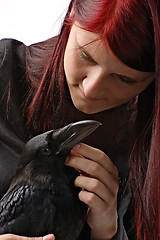 Image showing young woman with raven