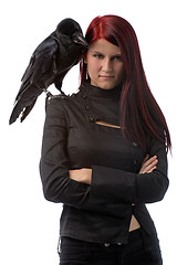 Image showing young witch with raven