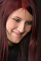 Image showing smiling red-haired woman